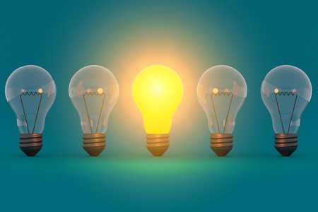 New great idea concept glowing bulb on blue green backgroundの写真素材