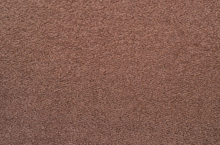 Light brown texture background. Textile cloth backdrop.