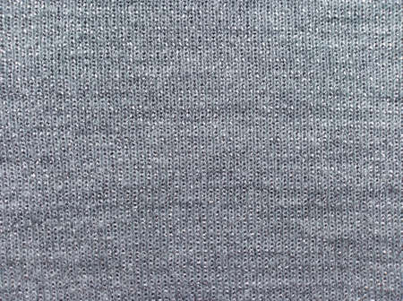 Sparkle glitter silver background. Silver shiny textile background.の写真素材