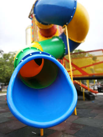 Close up colourful slide exit in the park.の写真素材