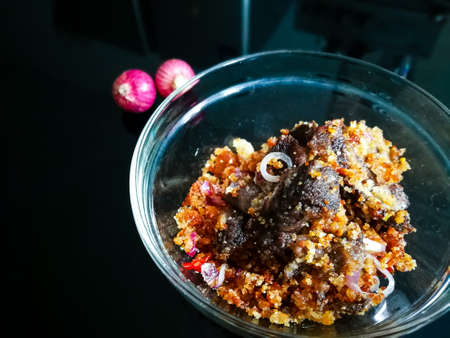 Cooked perkasam daging (fermented meat) served in bowl. A Malaysian delicacy. It is usually made from cow's meat, and the main source of carbohydrate for the fermentation process is ground roastの写真素材