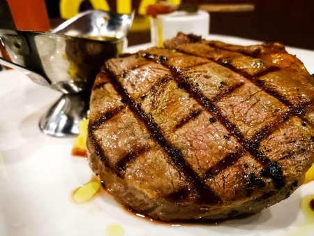 Delicious juicy meat steak served on a plate.のeditorial素材