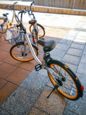 Putrajaya, Malaysia - May 12, 2018: Bike sharing OBIKE innovative free floating no docking station system to lock the bicycle locker integrated to leave everywhere.のeditorial素材