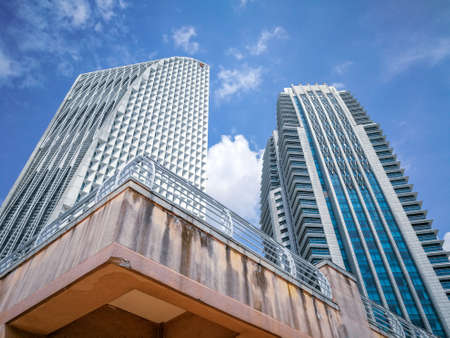 Putrajaya, Malaysia - May 12, 2018: Administration buildings under cloudy blue skies in daytime.のeditorial素材