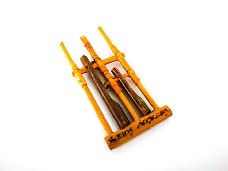 Angklung is a traditional instrument from Indonesia, isolated on white background.の写真素材