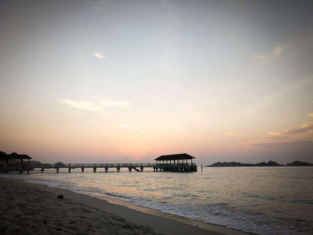 Sunrise over jetty and beautiful beach in Redang Island, Malaysia.のeditorial素材