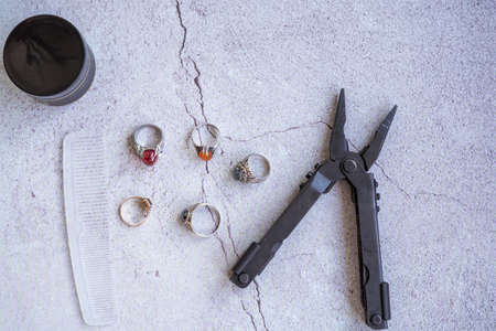 Stylish men's rings, pen, tools, hankerchief, pomade and perfume for grooming. Metrosexual...