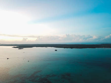 Aerial view of beautiful landscape near the island and sea gypsy water village with the water chalet stilt house during sunrise in Bum Bum island Semporna, Sabah, Malaysia.の写真素材