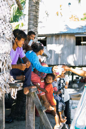 Sibuan, Malaysia - November 26, 2019: Bajau Laut people in their village in Sibuan island, aSemporna. They inhabit villages on the island.のeditorial素材
