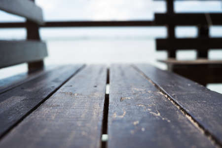 Close-up picture of an old wooden benchの写真素材