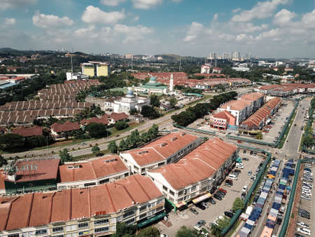 Selangor, Malaysia - November 3, 2019: Aerial view of Bandar Baru Bangi city in the morning. Pasar Tani or farmer's market along the road.のeditorial素材