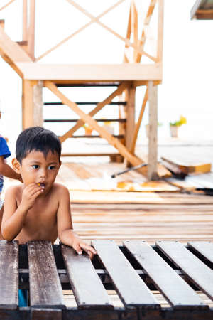 Semporna, Malaysia - NOvember 27, 2019: Portrait of a child in Egang - Egang near Pulau Bum Bum,...