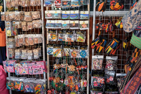Semporna, Malaysia - November 28, 2019 :  Local selling good to tourist near the dragon inn building, a tourist attraction.のeditorial素材