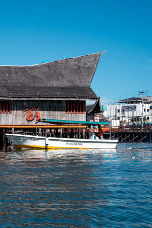 Semporna, Malaysia - November 28, 2019 :  Boats, houses, and jetty near the Semporna Town.のeditorial素材