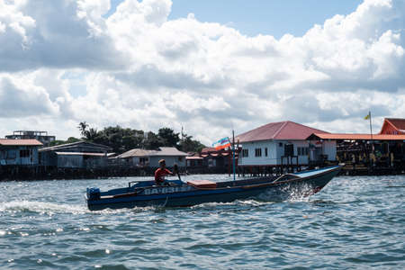 Semporna, Malaysia - November 28, 2019 :  Boats, houses, and jetty near the Semporna Town.のeditorial素材