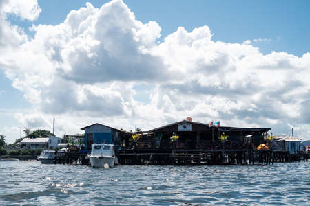 Semporna, Malaysia - November 28, 2019 :  Boats, houses, and jetty near the Semporna Town.のeditorial素材