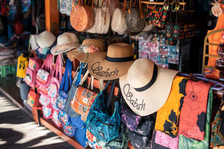 Semporna, Malaysia - November 28, 2019 :  Local selling good to tourist near the dragon inn building, a tourist attraction.のeditorial素材