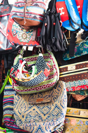 Semporna, Malaysia - November 28, 2019 :  Local selling good to tourist near the dragon inn building, a tourist attraction.のeditorial素材
