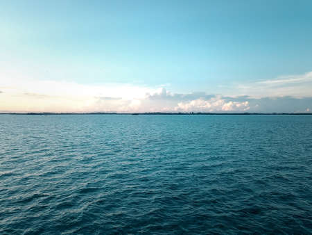 Aerial wide panorama of Bum Bum Island against an early morning blue sky colourful sunrise in Semporna, Borneo Sabah, Malaysia.の写真素材