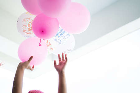 Happy Birthday colourful balloons together. Natural lights, selective focus.