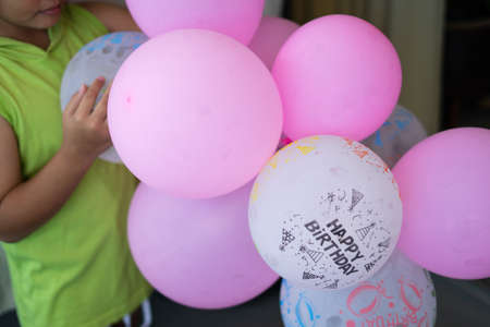 Happy Birthday colourful balloons together. Natural lights, selective focus.の写真素材