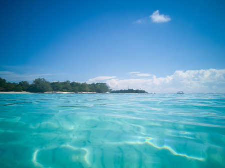 wide panorama of sea against sky at the tropical island in Semporna, Borneo Sabah, Malaysia.の写真素材