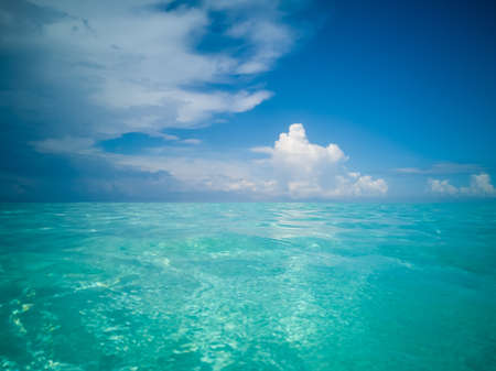 wide panorama of sea against sky at the tropical island in Semporna, Borneo Sabah, Malaysia.の写真素材