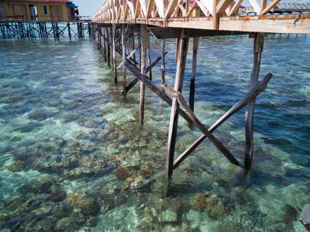 scenery sunny day above the coral reef during low tide in Semporna island. during low tide we can...
