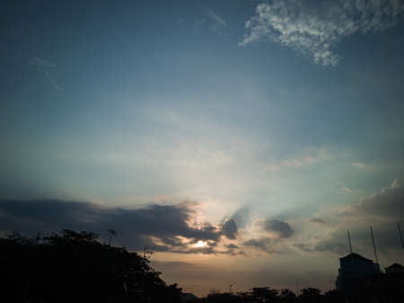 Sunset behind clouds in Negeri Sembilan, Malaysia.
