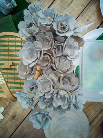 Recycled egg cartons turned into many Flower Art pieceの写真素材
