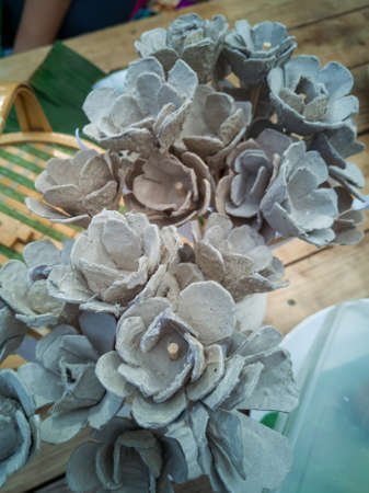 Recycled egg cartons turned into many Flower Art pieceの写真素材