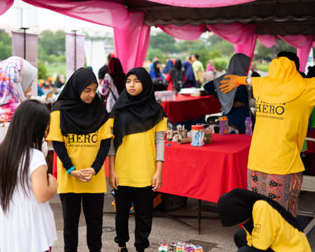 Bangi, Malaysia - Oct 6, 2019: Trash Hero Malaysia activists educating visitors with handling trash. Sustainable and environmental friendly.のeditorial素材