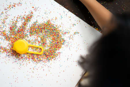 Colourful Sugar sprinkles, decoration for cake and ice-cream and cookies. Top view, Flat layの写真素材
