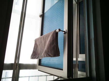 Kitchen microfiber cloth drying at the window mounted aluminium and pvc pipe towel rack. Home DIY...