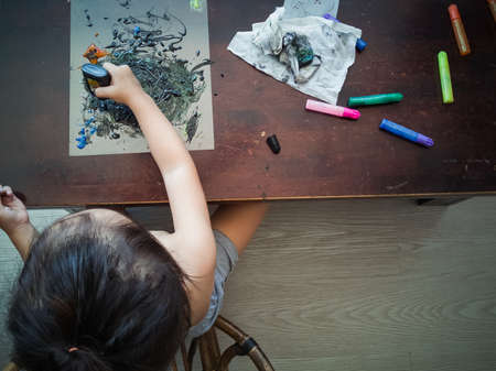 Toddler child painting at home, creative free timeの写真素材