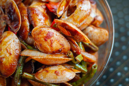 Spicy Paphia textile, or known as retak seribu lala fried with chillies. Served in a bowl. selective...