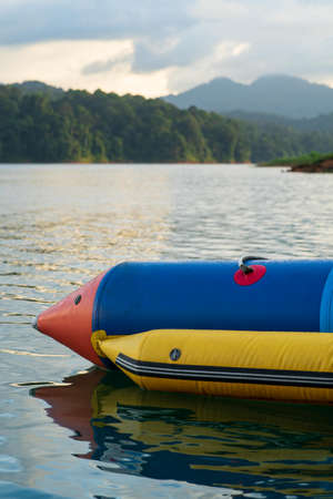 Banana Boat mooring on a lake in Kenyir, Malaysia.