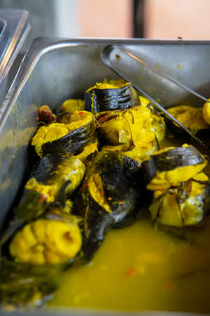 Ikan patin masak tempoyak is one of the famous dish in Pahang, Malaysia. Baung fish tempoyak a...
