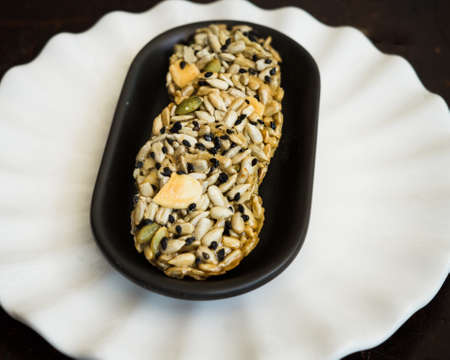 homemade Florentine,traditional almond on a dark wooden background.