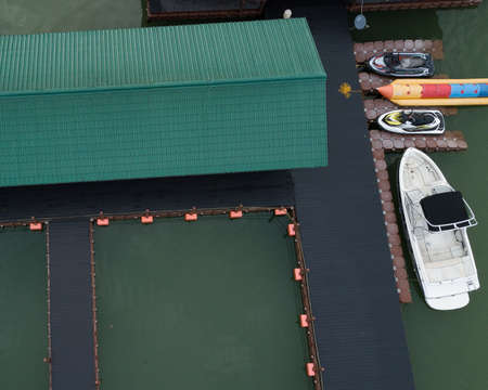 Aerial top view of water chalet resort in Kenyir Lake, Terengganu, Malaysia.