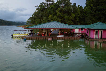 Kenyir, Malaysia - July 23, 2020: Aerial top view of water chalet resort in Kenyir Lake, Terengganu, Malaysia.のeditorial素材