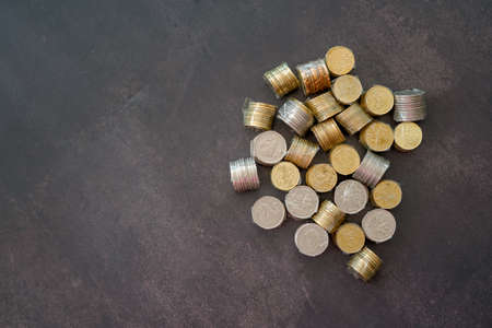Coins of Malaysia. Financial Planning concept .The coins are arranged in value. Wrapped with clear tape for easy exchange at the shop.の写真素材