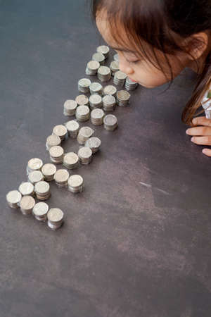 Coins of Malaysia. Financial Planning concept .The coins are arranged in value. Wrapped with clear...