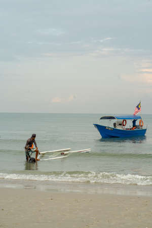 Negeri Sembilan, Malaysia - Sept 26, 2020:  Boatman getting ready for the tourists at Port Dickson.のeditorial素材