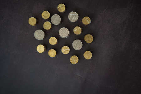 Coins of Malaysia. Financial Planning concept .The coins are arranged in value. Wrapped with clear tape for easy exchange at the shop.の写真素材