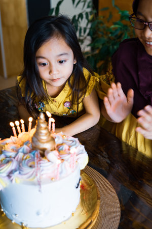 Birthday celebration of a little girl at home.