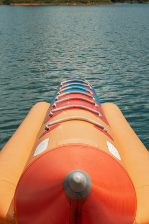 Banana boat front view at the lake sea.の写真素材