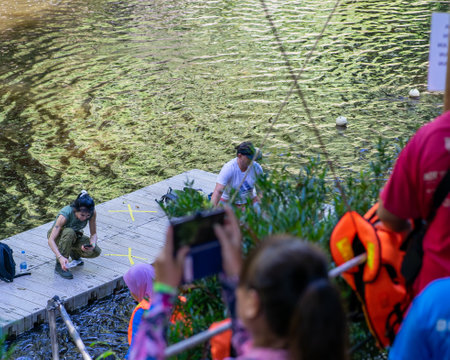 Kenyir, Malaysia - July 23, 2020: People at the Kelah Sanctuary in Lubuk Kejor.のeditorial素材
