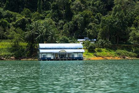 Kenyir, Malaysia - July 22, 2020: Floating Police Station in Kenyir Lake.のeditorial素材