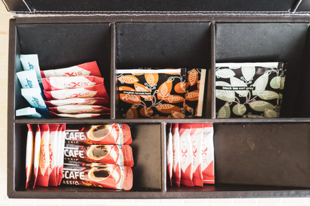 Port Dickson, Malaysia - December 17, 2020: A box of complimentary tea and coffee in a hotel room at...